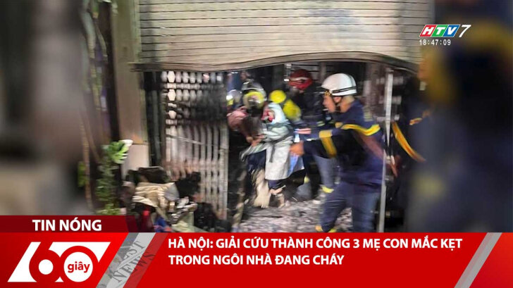 canh sat giai cứu 3 nạn nhân mắc kẹt trong đám cháy ở Ha  Nội